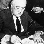 President Franklin D. Roosevelt signing the War Declaration against Japan