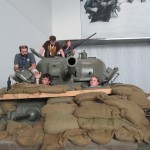 To understand the roles of a tank crew, students take positions inside a Sherman Tank at The National WWII Museum.