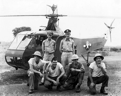 Lt. Harman (standing left) with ground crew in front of the Sikorsky YR-4B in January 1945. Image courtesy of the U.S. Air Force Museum.