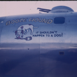 Nose art on a B-29 named Booze Hound at Isley Field on Saipan in 1945. Gift of Lisle Neher, from the collection of The National WWII Museum.