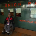 Kuroki in front of the Nebraska labelled train car at  The National WWII Museum