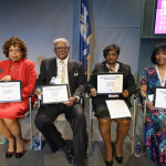Allene Carter, Willie Rivers, Margaret Pender, and Sandra Holliday proudly holding the brick certificates that honor their relatives. All seven African Americans who received the Medal of Honor for their service in World War II will have a brick placed at the Museum in their honor.