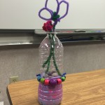 Gilchrist Elementary students know how to reuse a plastic water bottle-- make it a pretty flower vase!