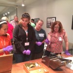 One of the things teachers did at the museum was to examine WWII artifacts.