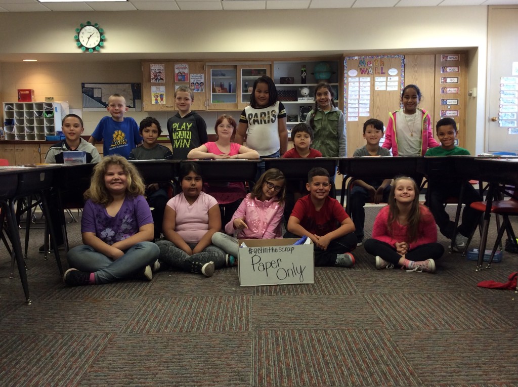 Monroe Elementary students proudly display their recycling box.